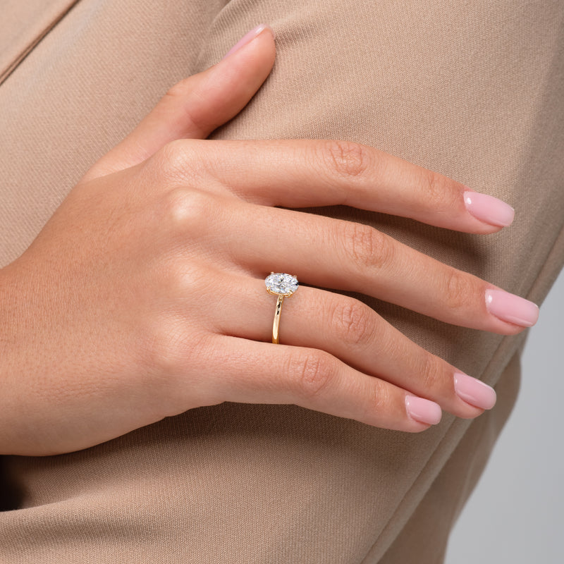 Sofia yellow gold engagement ring by Stellini Diamonds featuring a sparkling center stone and elegant band design.