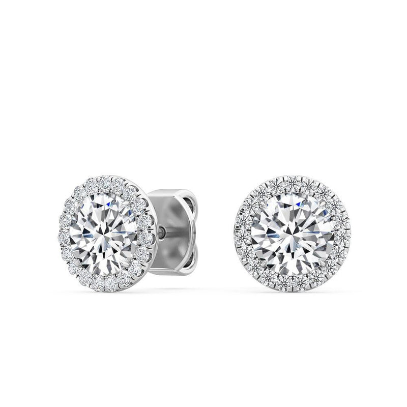 Round Halo Ohrringe by Stellini Diamonds featuring a shimmering halo design with sparkling gemstones.