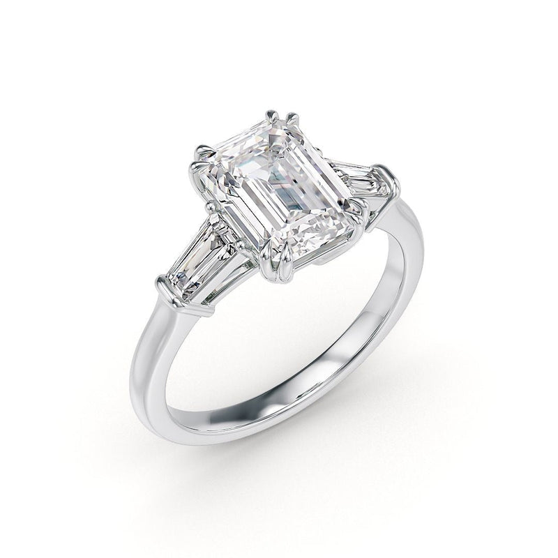 Stellini Diamonds Victoria platinum engagement ring featuring a triologie emerald cut design.